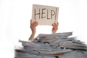 Help Poster on a pile of Files - Dixon & Moselet Attorney at Law
